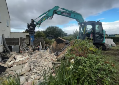 SM Services demolishing part of an old building